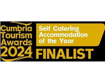 a sign that reads wildlife tourism tourism awards finalist at Red Squirrel Cottage, Hutton luxurious cottage in a rural setting 10 minutes to Ullswater 15 minutes to Keswick in Penruddock