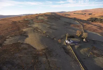 an aerial view of a field with a truck at Corriedow in Thornhill