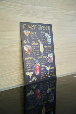 a chalkboard menu with different alcoholic drinks on it at 1 BDR Apt By Caledonia Luxe Stays Short Lets & Serviced Accommodation Lanark in Douglas