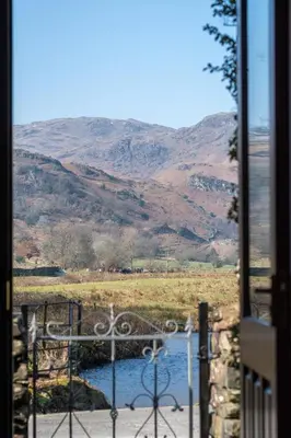 a view of a mountain from a window at 2 Bed in Grasmere oc-gl081 in Grasmere