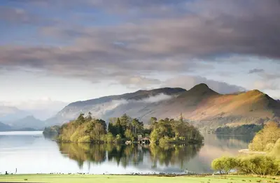a view of a lake with trees and mountains at 2 Bed in Portinscale oc-gl129 in Portinscale