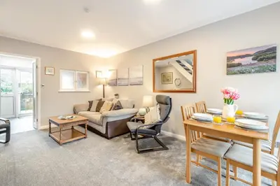 a living room with a couch and a table at 2 Bed in Grasmere oc-ld175 in Grasmere