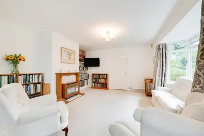 a living room with white furniture and a fireplace at 3 Bed in Grasmere oc-ld181 in Grasmere