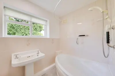a white bathroom with a sink and a toilet at 3 Bed in Grasmere oc-ld181 in Grasmere