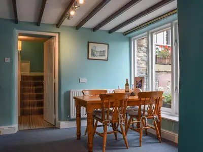 a dining room with a wooden table and chairs at Lowther - Np2801 in Dockray