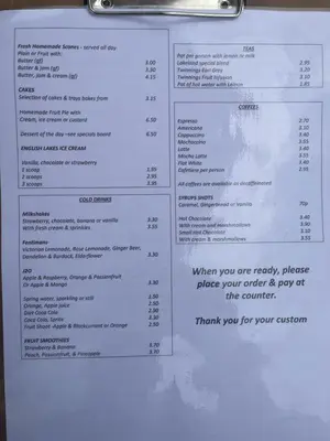 a menu for a restaurant on a table at Lake District Luxury Lodge in Plumbland