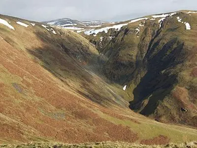 a large mountain with snow on top of it at Rose Cottage - 28176 in Fairgirth