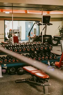 a gym with a rack with lots of equipment at Marine Troon in Troon