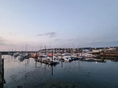 a group of boats docked in a harbor at Home from home in Maryport in Maryport