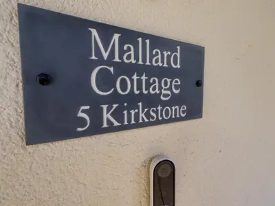 a sign that reads malland coffee kickinghoe at Mallard Cottage in Penrith