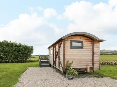 a tiny house with a pitched roof at Greenacres Carriage in Maybole