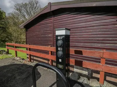 a parking meter in front of a building at Pod No 5 in Keswick