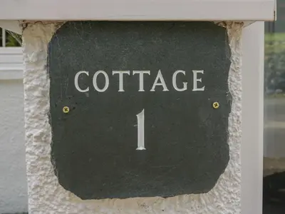 a sign with the word coffee on it at Garden Cottage No 1 in Keswick
