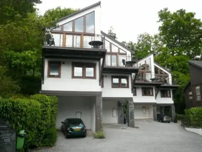 a house with a car parked in front of it at Keswick Bridge 6, within walking distance of Keswick town centre, strictly no pets in Keswick