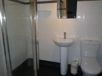a bathroom with a toilet and a sink and a shower at Keswick Bridge 6, within walking distance of Keswick town centre, strictly no pets in Keswick