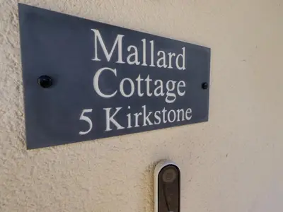 a sign that reads malland coffee at Mallard Cottage Lake District, Leisure Spa Pool & Gym in Penruddock