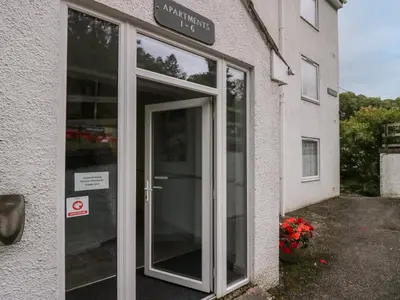 an entrance to a building with a glass door at Apartment 3 in Keswick