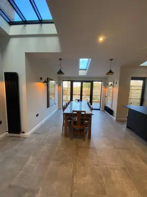 a dining room with a table in a house at Kirkcudbright 3 bed ultra modern brand new in Kirkcudbright
