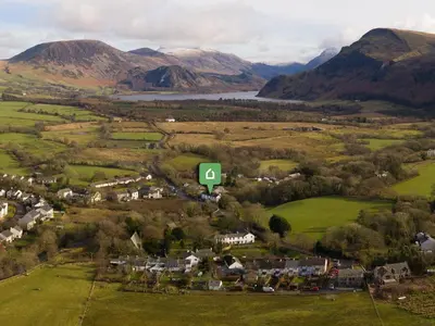 an aerial view of a small village in the mountains at 3 Bed in Ennerdale Bridge SZ392 in Ennerdale Bridge