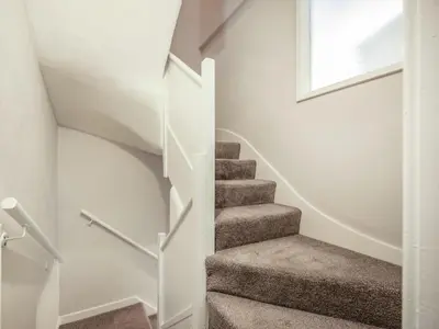 a staircase in a home with white walls at 2 Bed in Cockermouth oc-87481 in Cockermouth