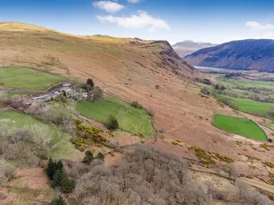 an aerial view of a hill with a farm on it at 2 Bed in Wasdale Head SZ053 in Nether Wasdale