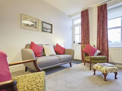 a living room with a couch and two chairs at 2 Bed in Keswick oc-sz009 in Keswick