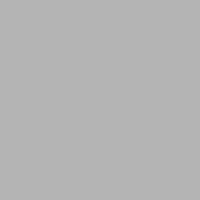 a kitchen with white cabinets and a table with flowers on it at 2 bed in Langholm 83344 in Langholm