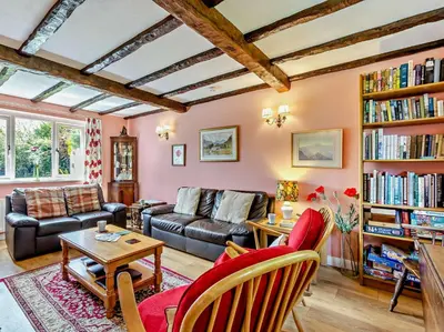 a living room with a couch and a table at 3 Bed in Threlkeld SZ047 in Threlkeld
