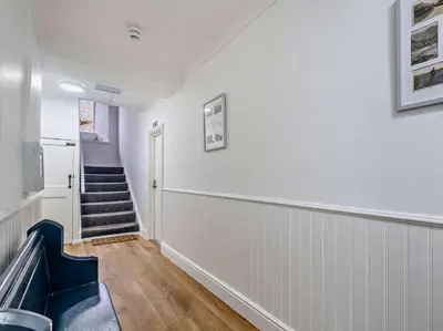 an empty room with stairs and a stair case at 1 Bed in Rosthwaite 86395 in Rosthwaite