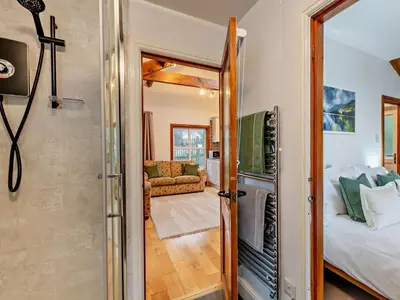 a door leading into a bedroom with a bed at 1 Bed in Keswick SZ516 in Keswick