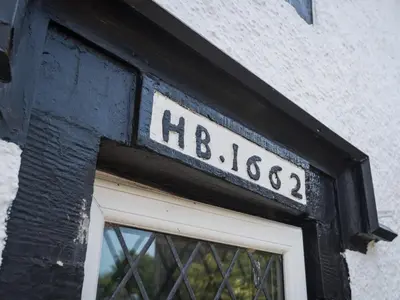 a sign above a door of a building at 3 Bed in Pardshaw SZ419 in Dean