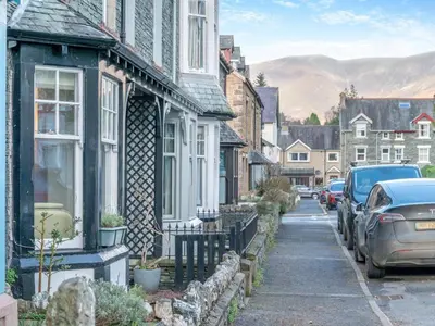 a street in a small town with cars parked at 3 Bed in Keswick oc-89526 in Keswick