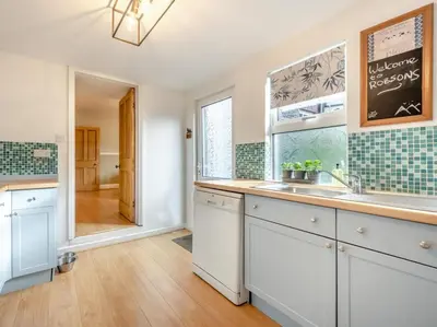 a kitchen with a sink and a window at 3 Bed in Keswick oc-89526 in Keswick