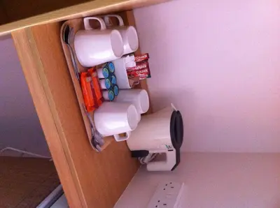a roll of toilet paper hanging from a door at Days Inn Hotel Abington - Glasgow in Abington