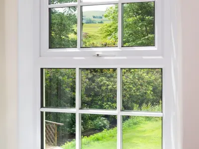 a window looking out at a garden outside at 6 Bed in Workington oc-sz151 in Lamplugh