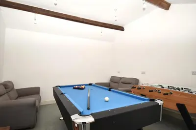 a room with a pool table in a room at 6 Bed in Workington oc-sz151 in Lamplugh