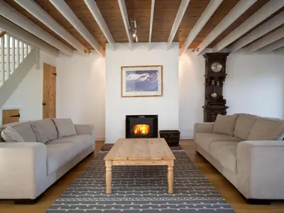 a living room with two couches and a fireplace at 3 Bed in Egremont oc-sz230 in Hale