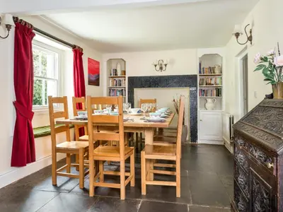 a dining room with a table and chairs at 6 Bed in Workington oc-sz327 in Lamplugh