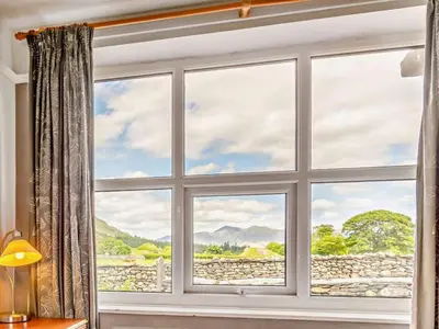 a window with a view of a mountain view at 3 Bed in Keswick oc-sz148 in Grange