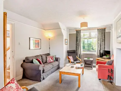 a living room with a couch and a table at 3 Bed in Keswick oc-sz148 in Grange