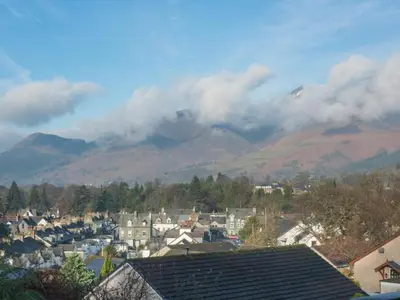 a view of a town with mountains in the background at 2 Bed in Keswick oc-sz116 in Keswick