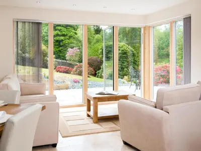 a living room with white furniture and a large window at 4 Bed in Keswick SZ267 in Keswick