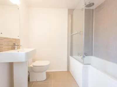 a bathroom with a sink and a toilet and a bath tub at 2 Bed in Keswick oc-sz415 in Bassenthwaite
