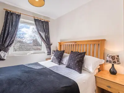a bedroom with a bed and a window at 3 Bed in Keswick SZ547 in Keswick