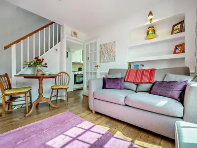 a living room with a couch and a table at 1 Bed in Keswick SZ472 in Keswick