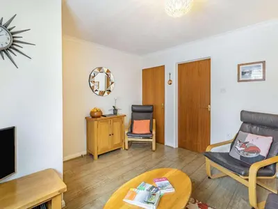 a living room with a couch and a table at 2 Bed in Keswick SZ462 in Keswick