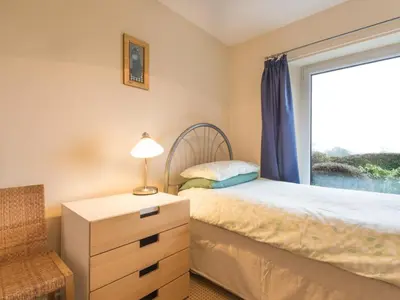a bedroom with a bed and a window at 3 Bed in Applethwaite SZ328 in Applethwaite