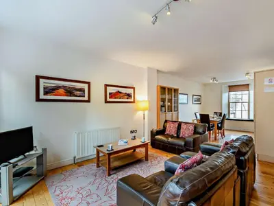 a living room with a couch and a tv at 2 Bed in Keswick oc-sz132 in Keswick