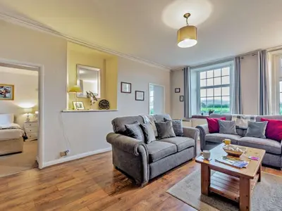 a living room with a couch and a table at 2 Bed in Wasdale oc-sz077 in Santon Bridge