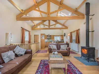 a living room with a couch and a wood stove at 2 Bed in Patterdale SZ470 in Patterdale